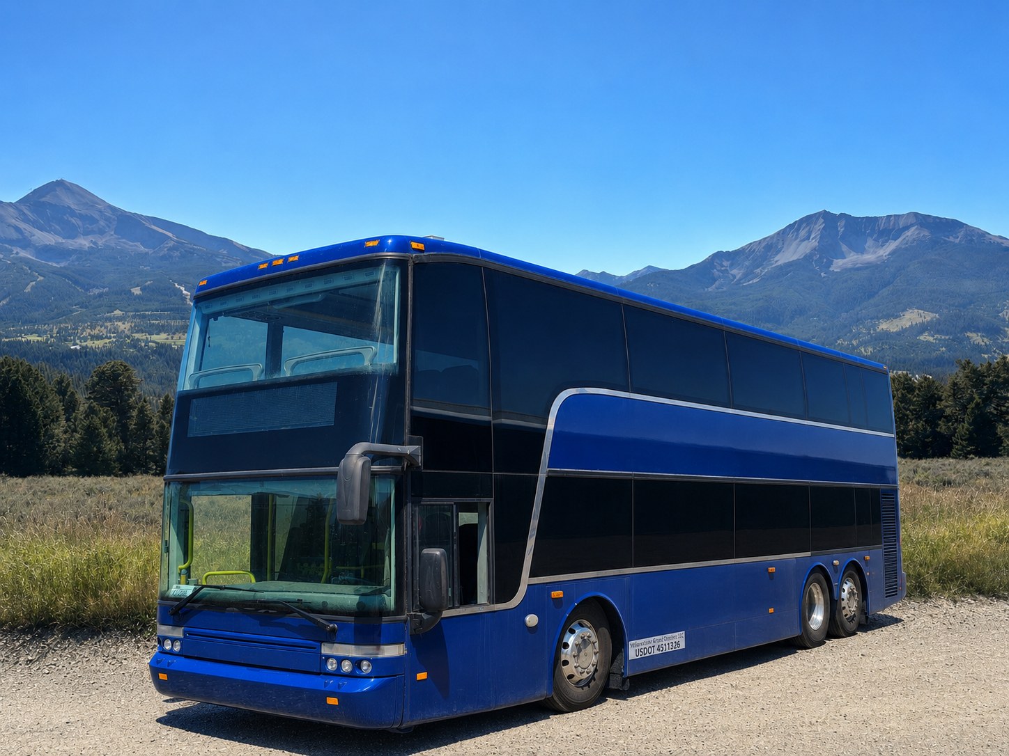 Montana's only luxury double-decker coach beneath the mountains